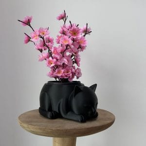 Decoratieve pot in de vorm van een poes om bloempotje in te plaatsen